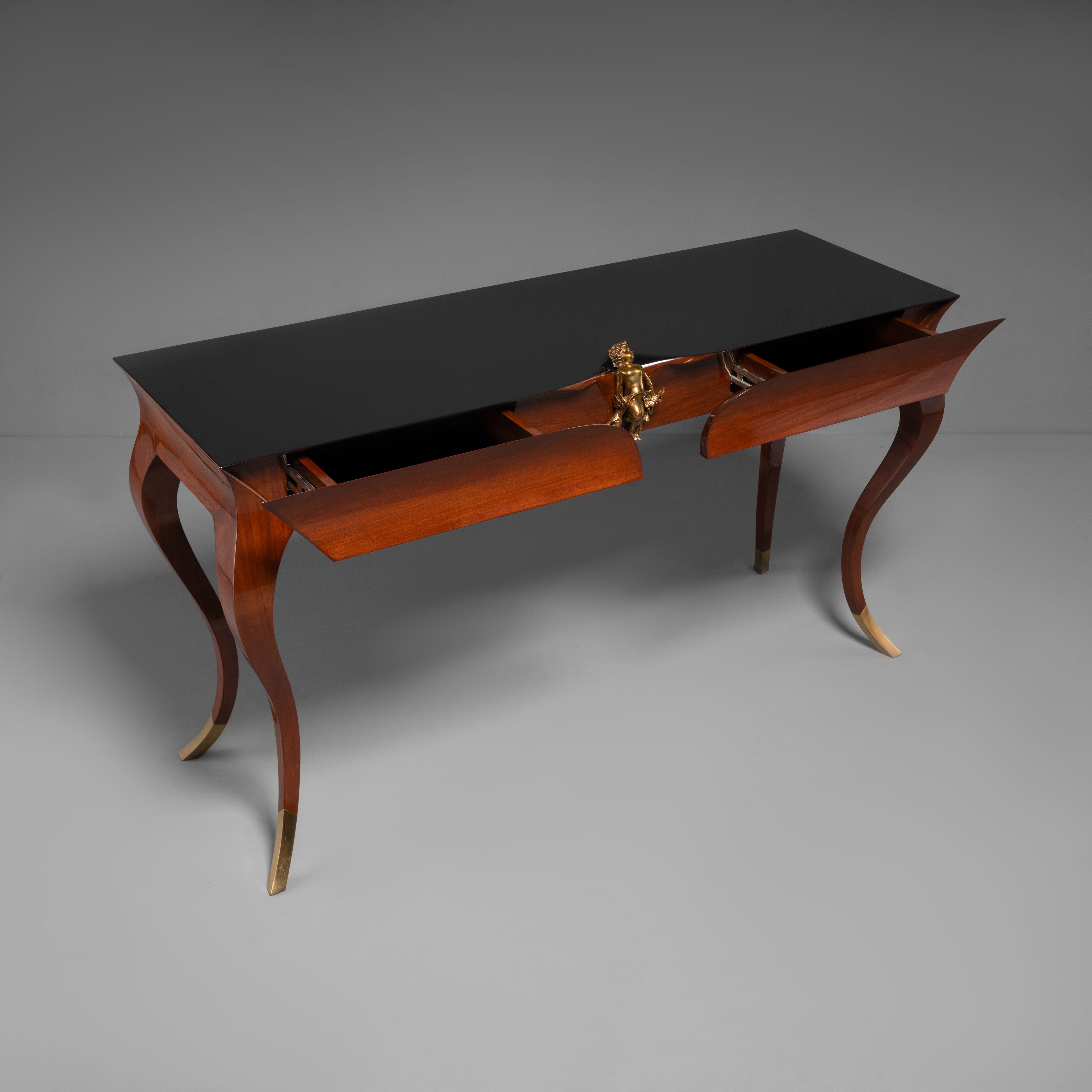 Rococo Revival Style Console Table with Gilt Cherub Ornament and Black Lacquer Top