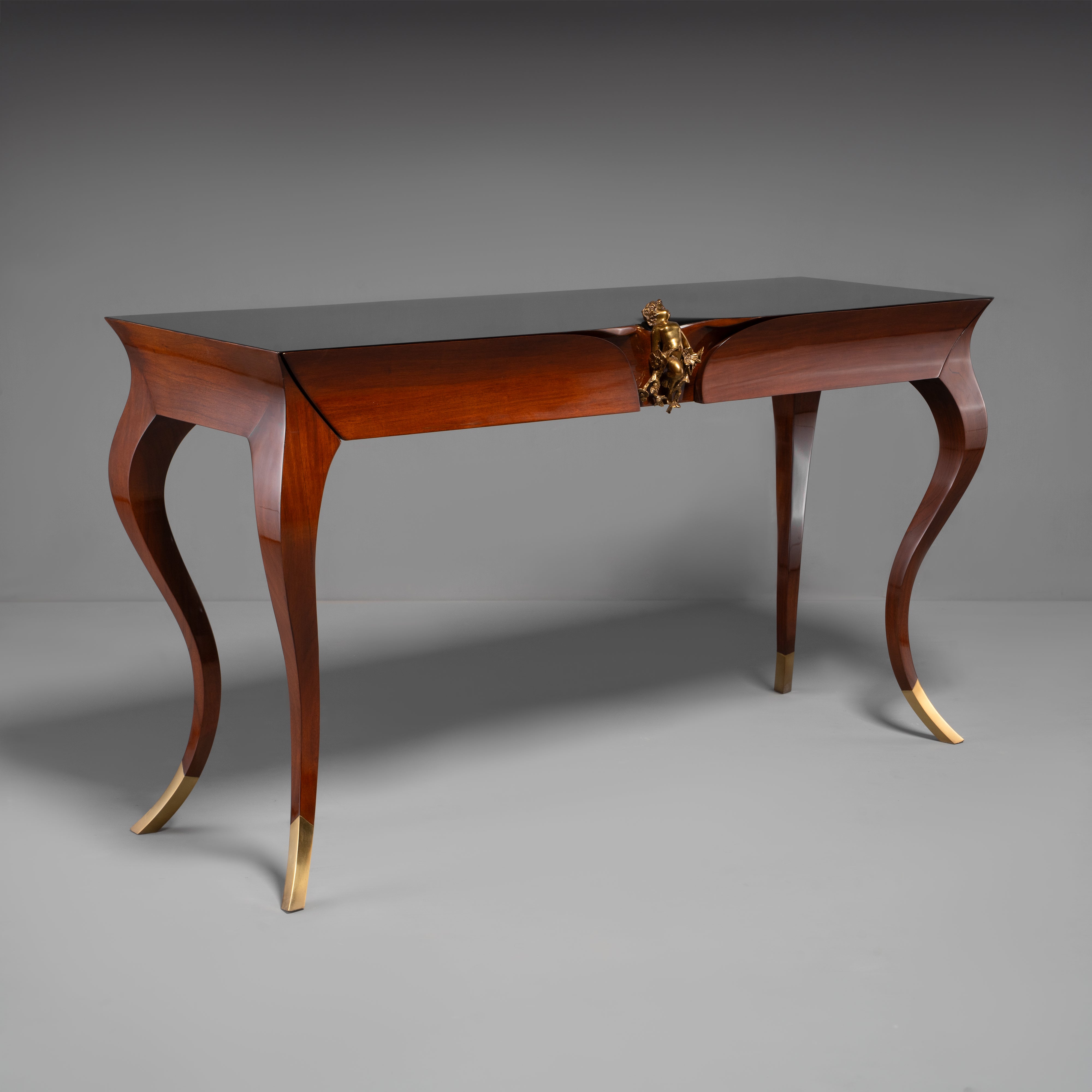 Rococo Revival Style Console Table with Gilt Cherub Ornament and Black Lacquer Top