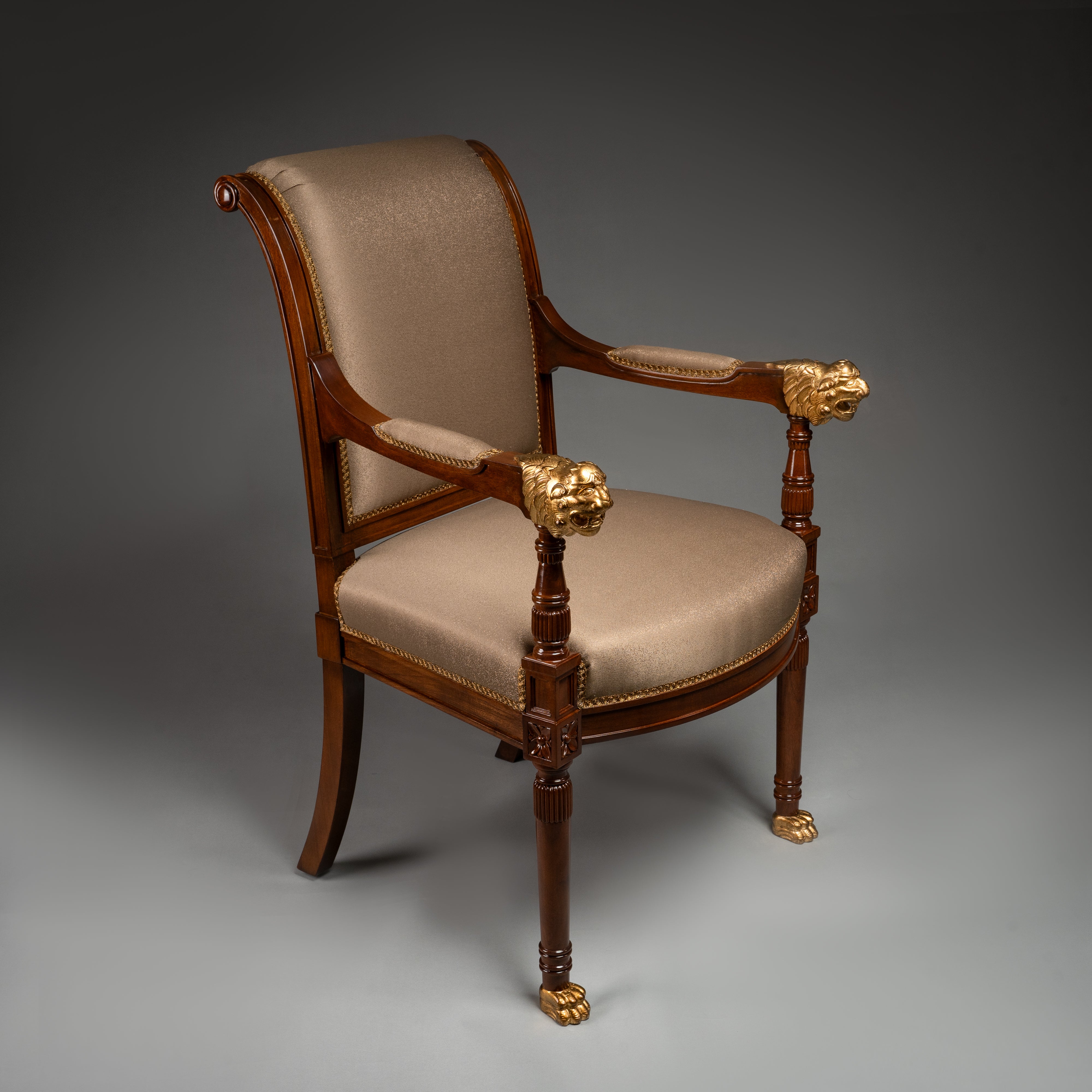 Empire-Style Mahogany Armchair with Gold Lion Head and Paw Details