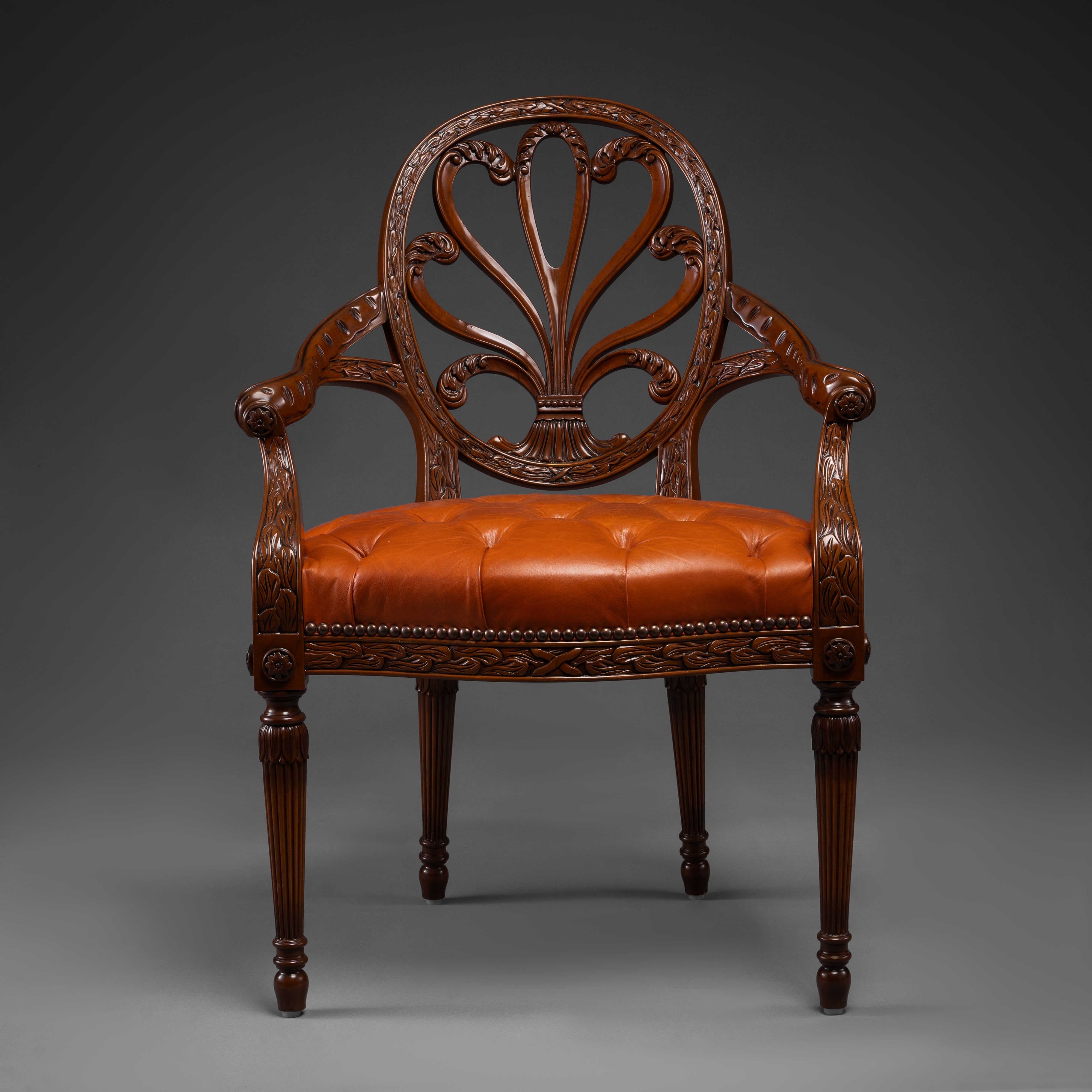 Mahogany Armchair with Carved Fan Back and Tufted Leather Seat