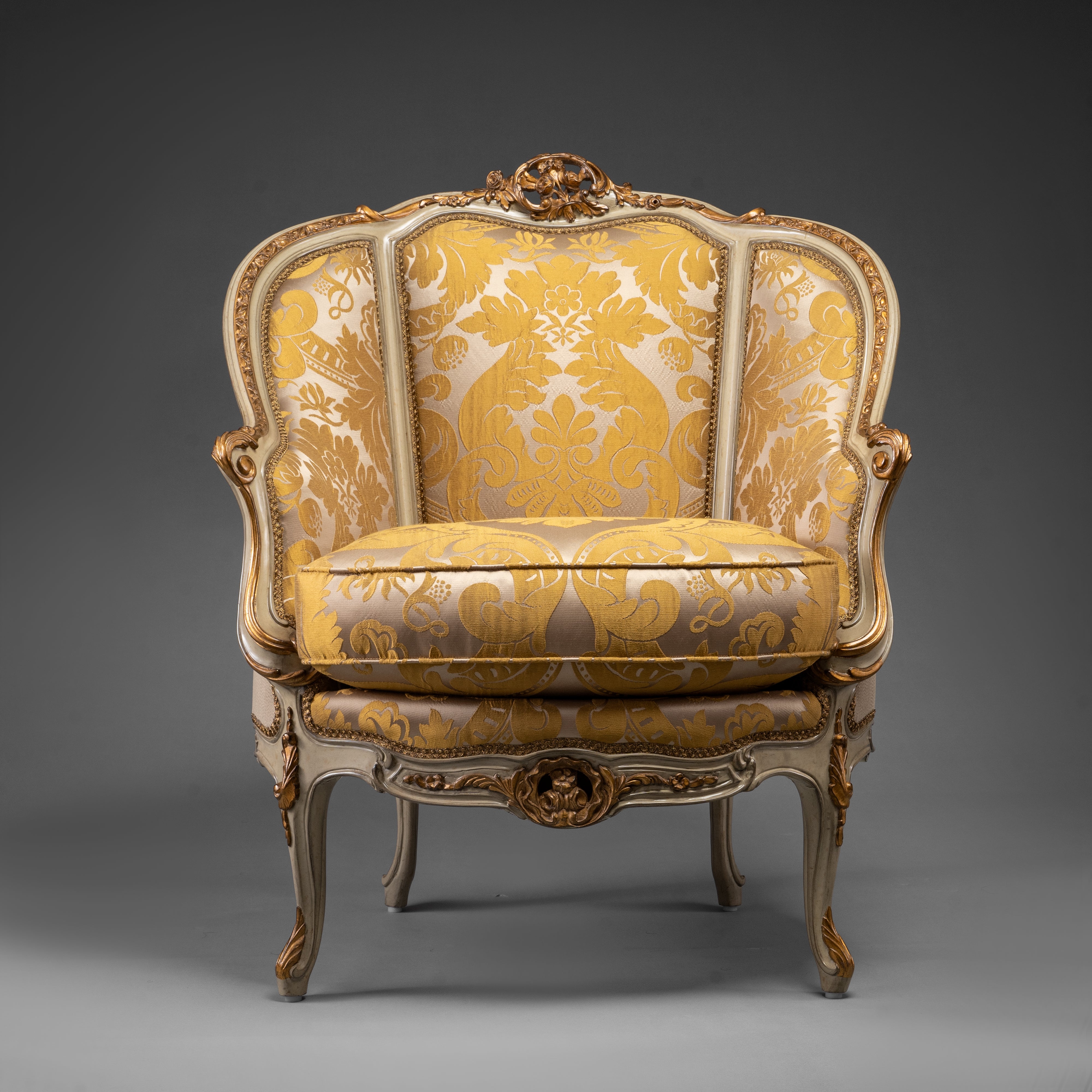 Vintage Louis XV-Style Armchair with Ornate Carvings and Golden Upholstery