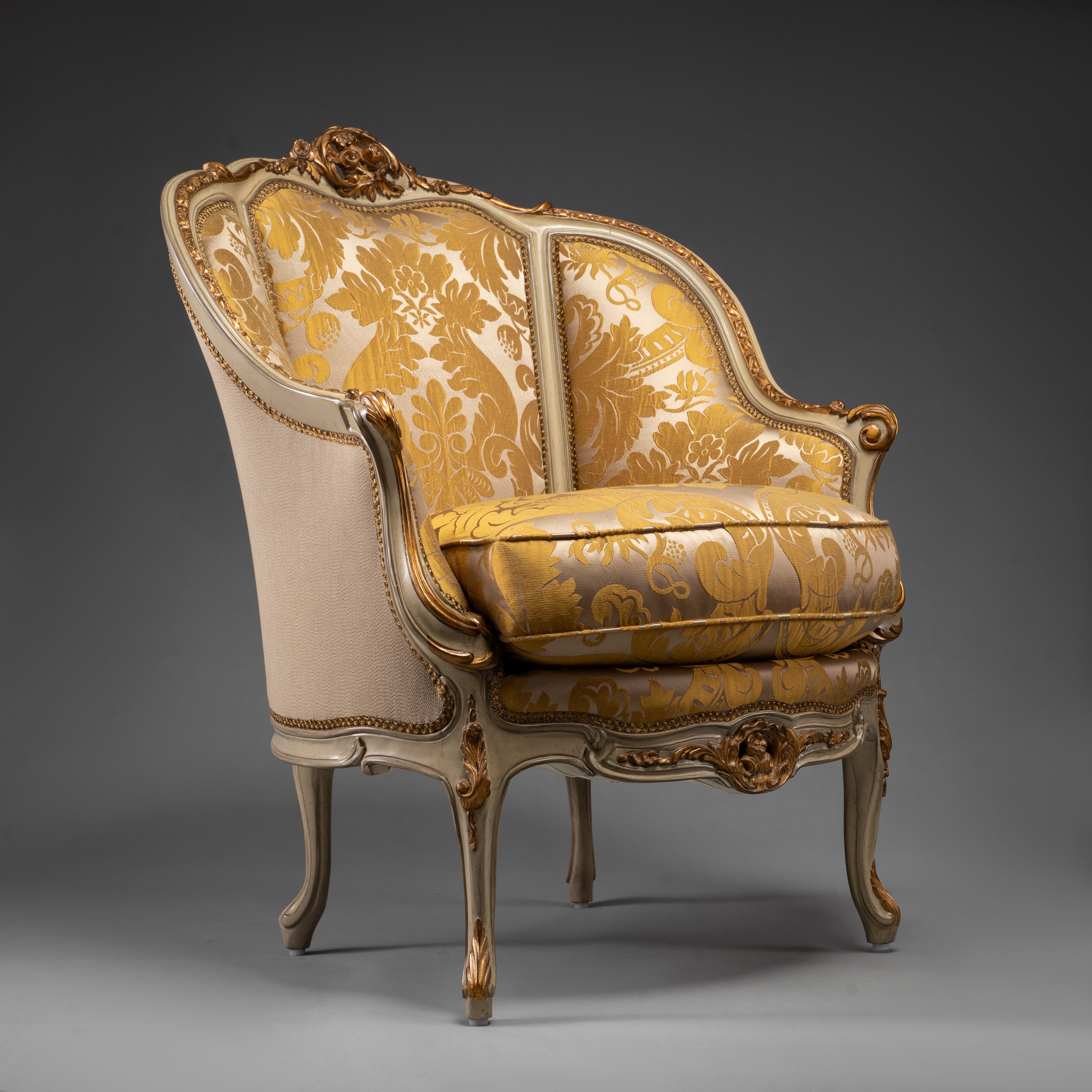 Vintage Louis XV-Style Armchair with Ornate Carvings and Golden Upholstery