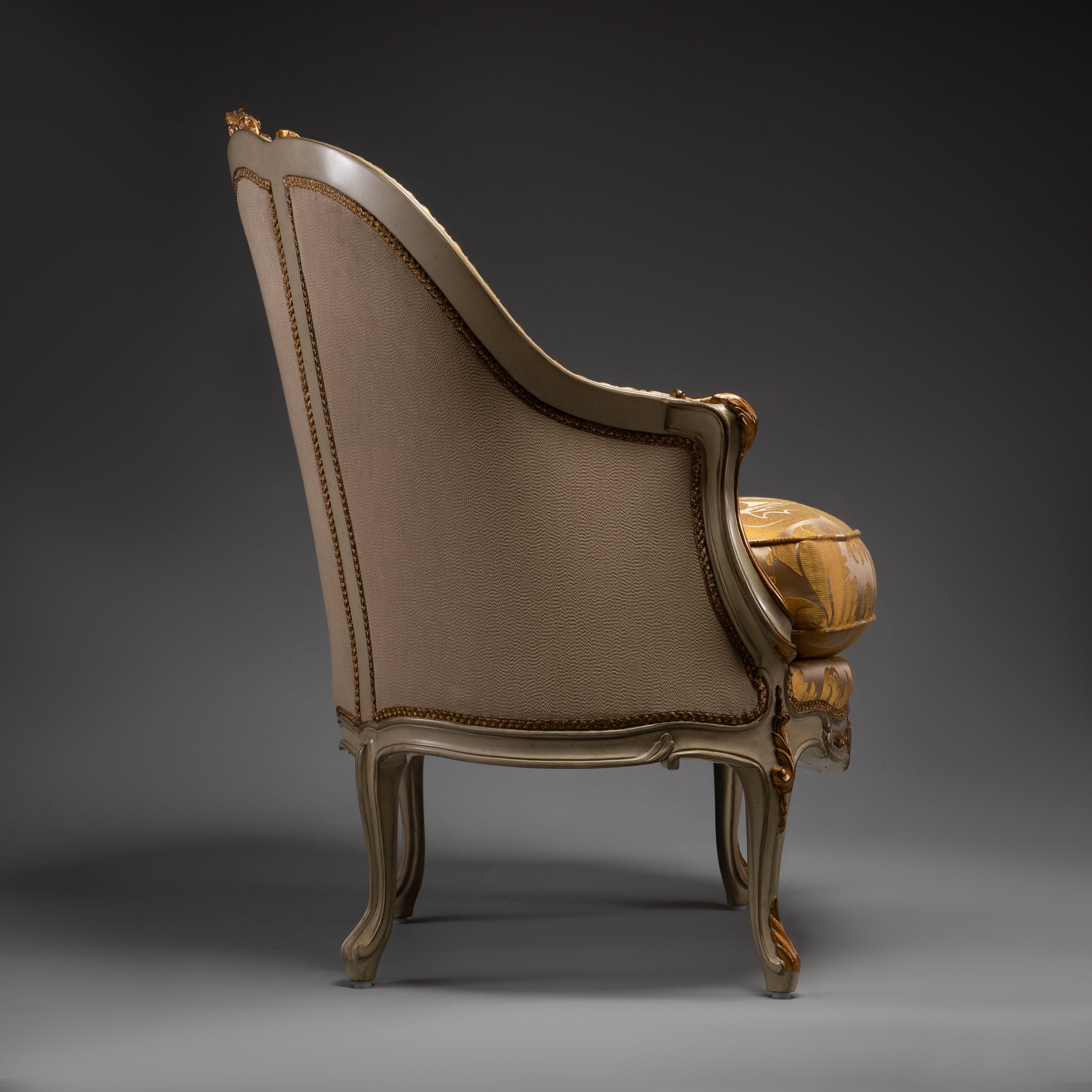 Vintage Louis XV-Style Armchair with Ornate Carvings and Golden Upholstery
