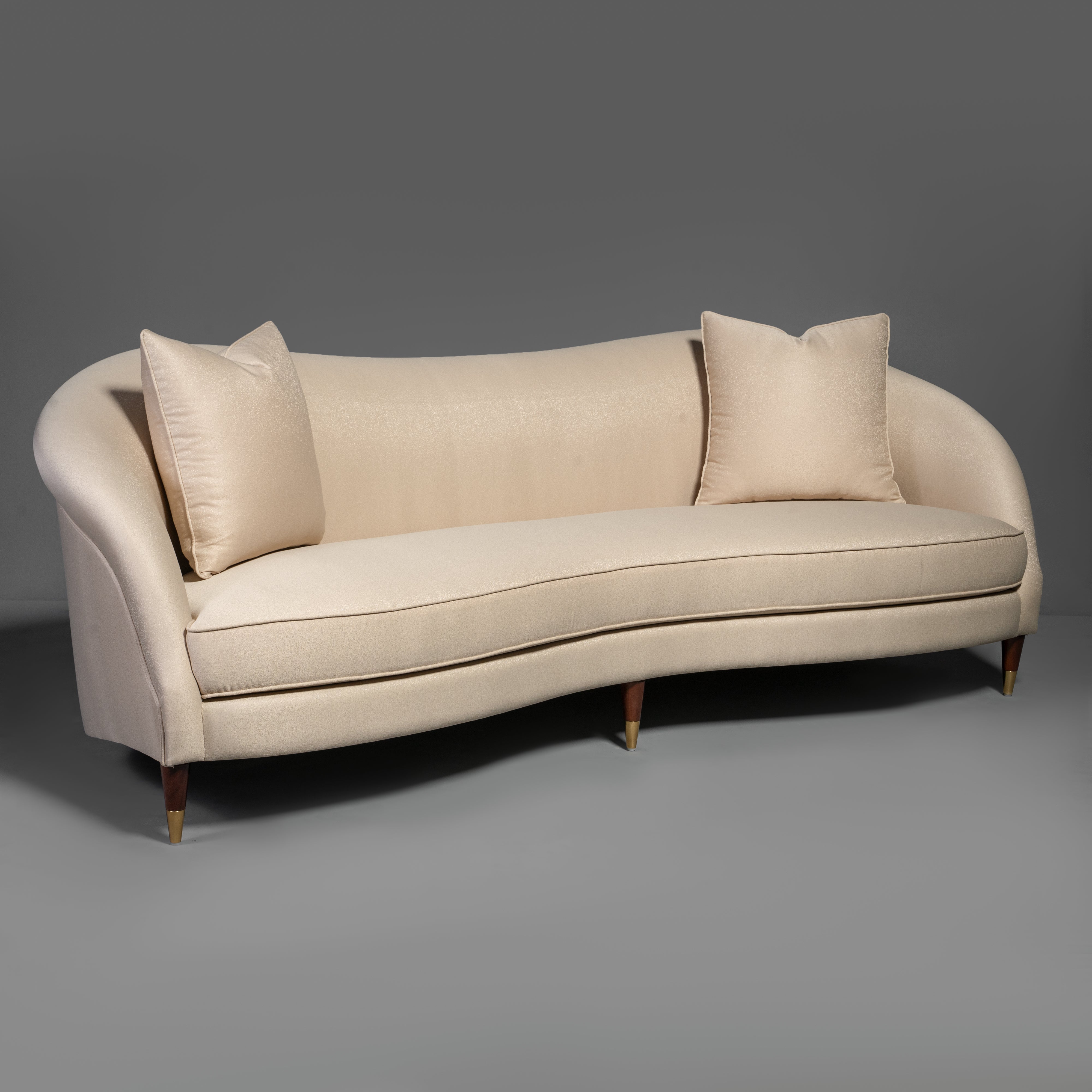 Contemporary Curvilinear Sofa with Tapered Brass Feet