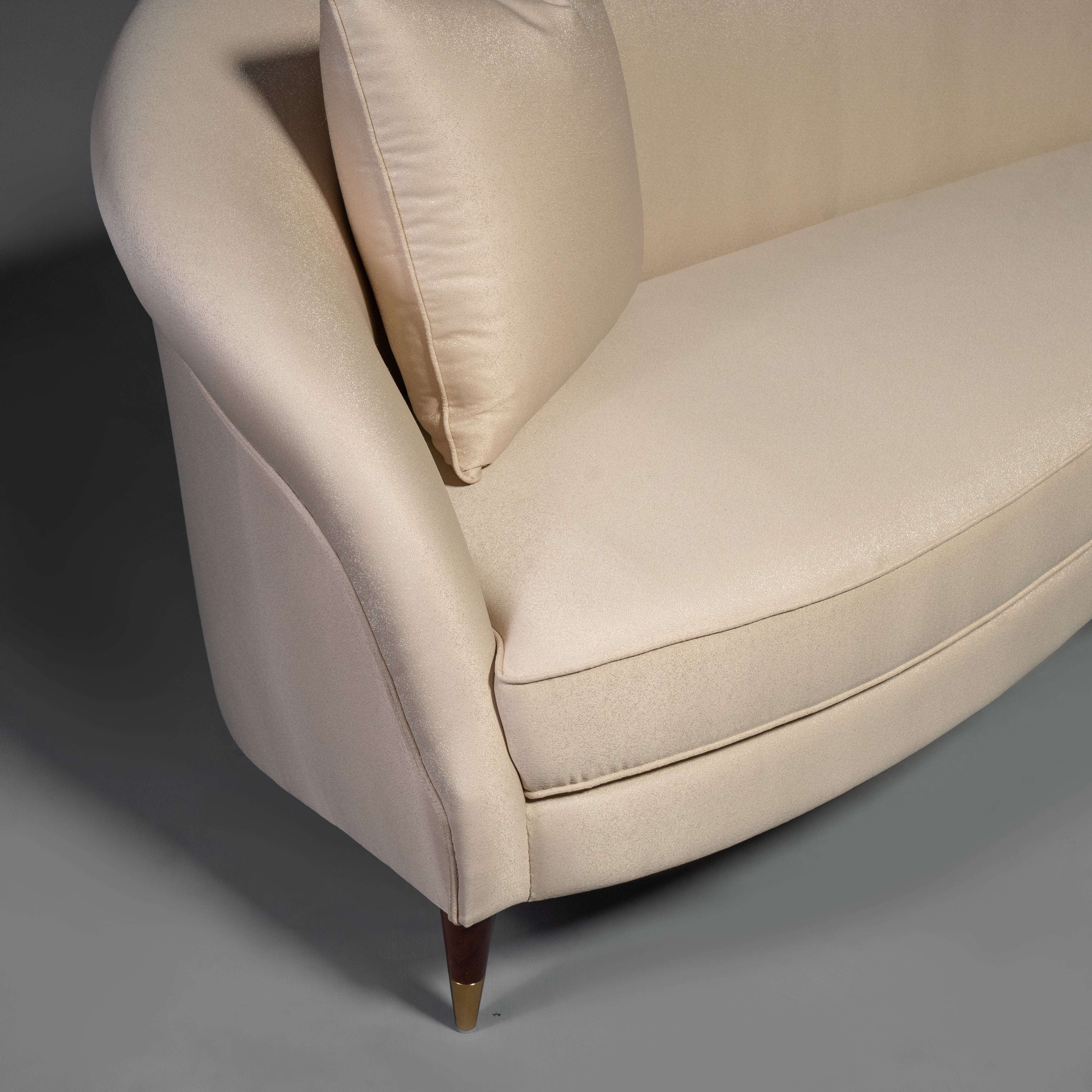 Contemporary Curvilinear Sofa with Tapered Brass Feet