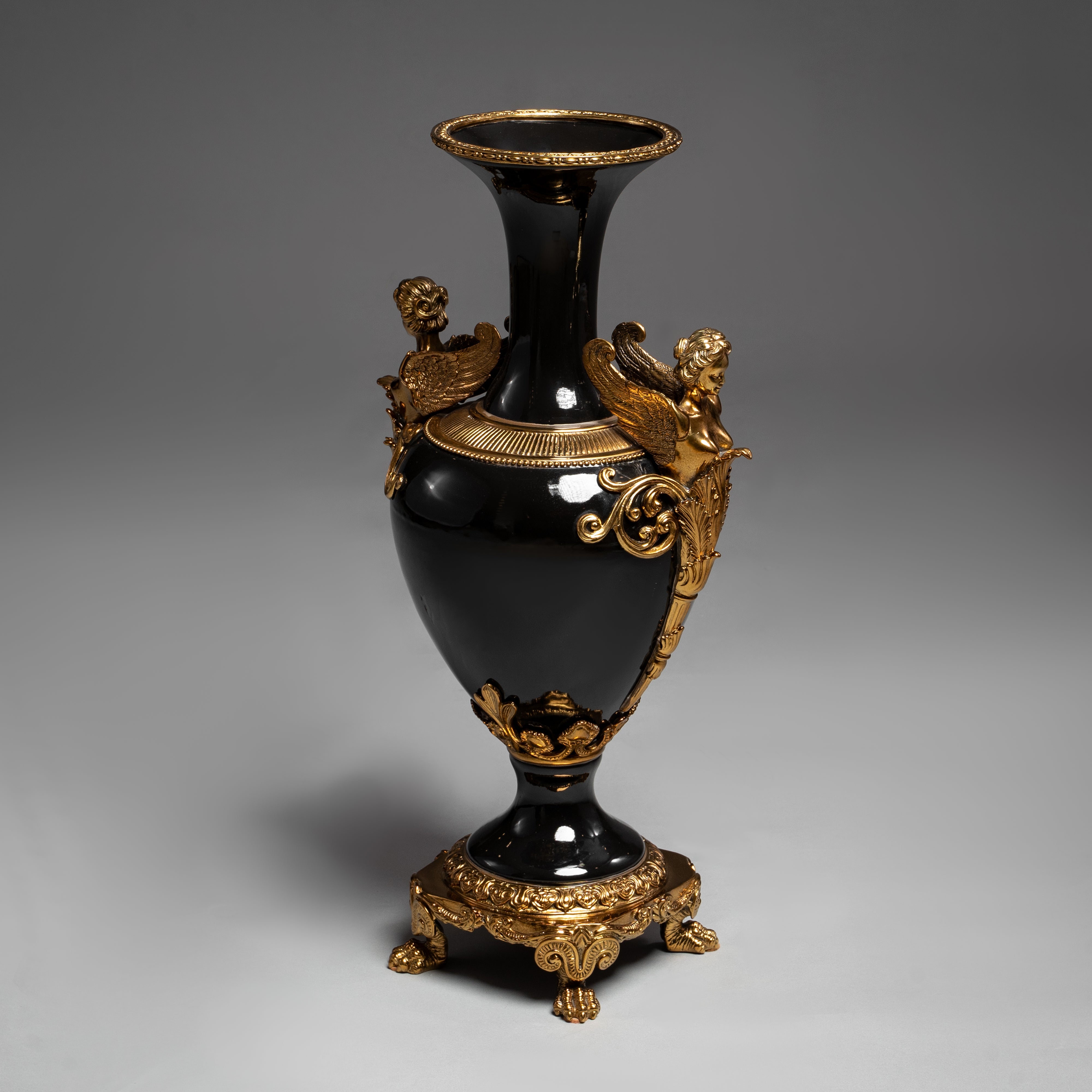 Elegant Black and Gold Neoclassical Vase with Winged Figures