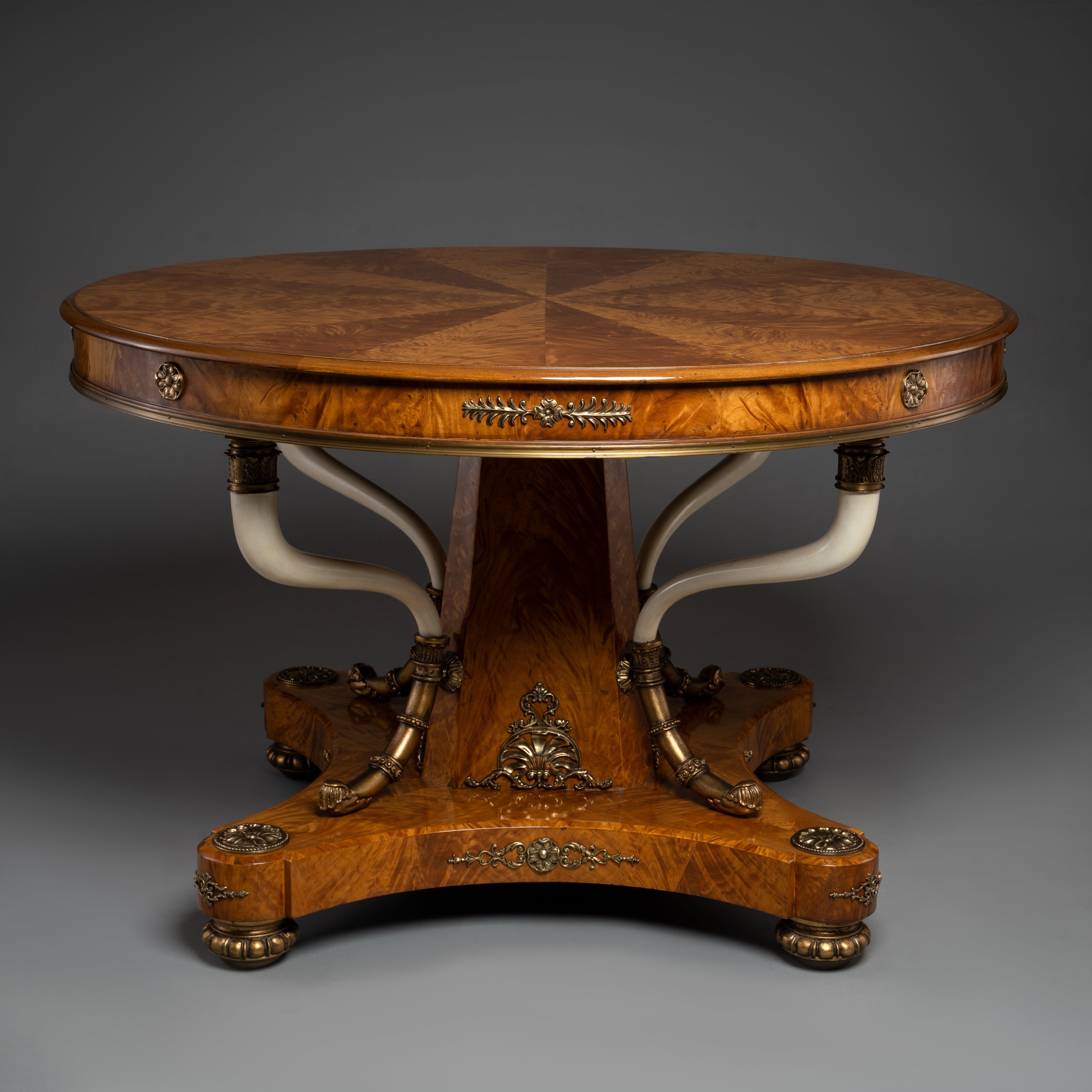 Regency Style Round Table with Inlaid Burl Wood and Ornate Brass Accents