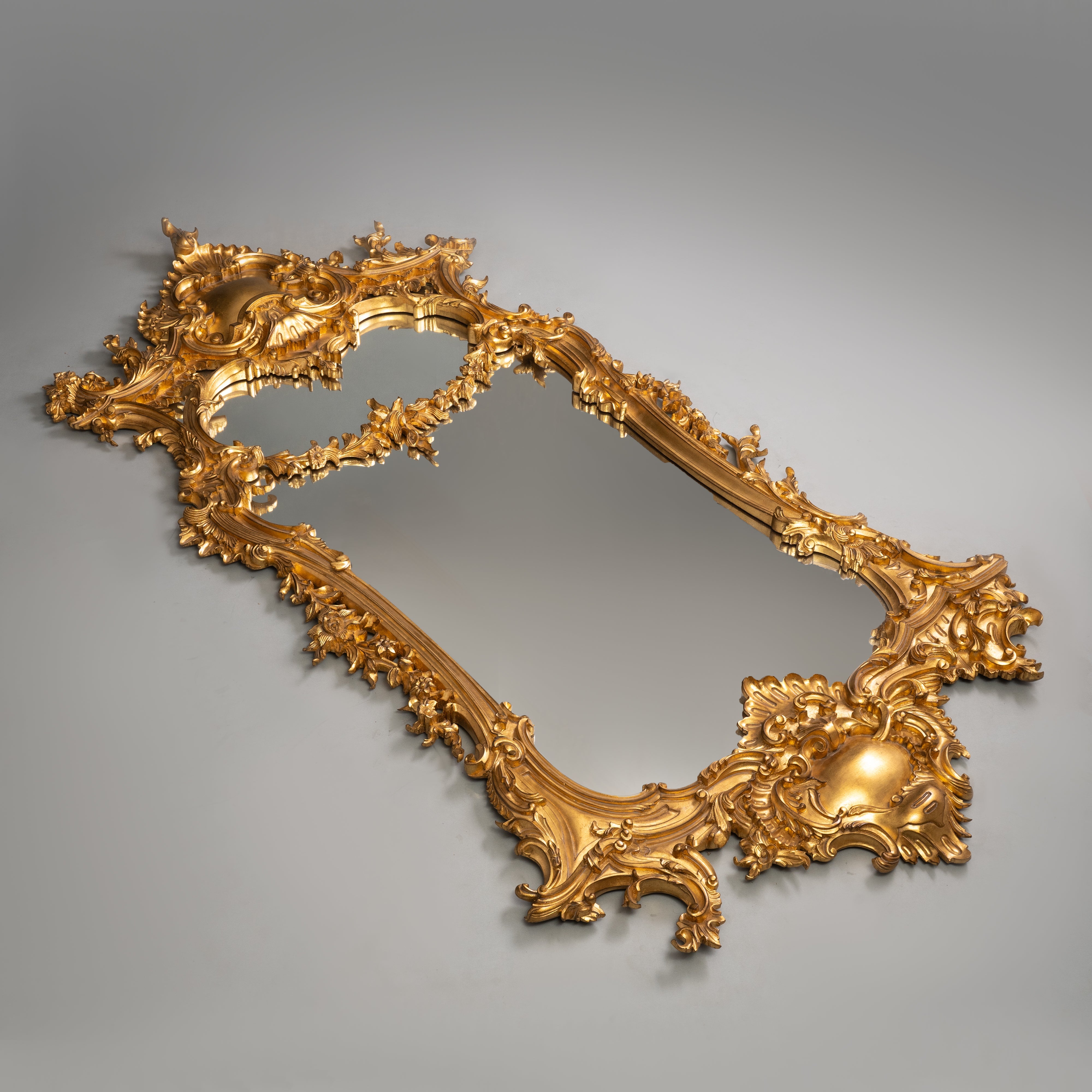 Rococo Style Giltwood Mirror with Elaborate Foliate Motifs