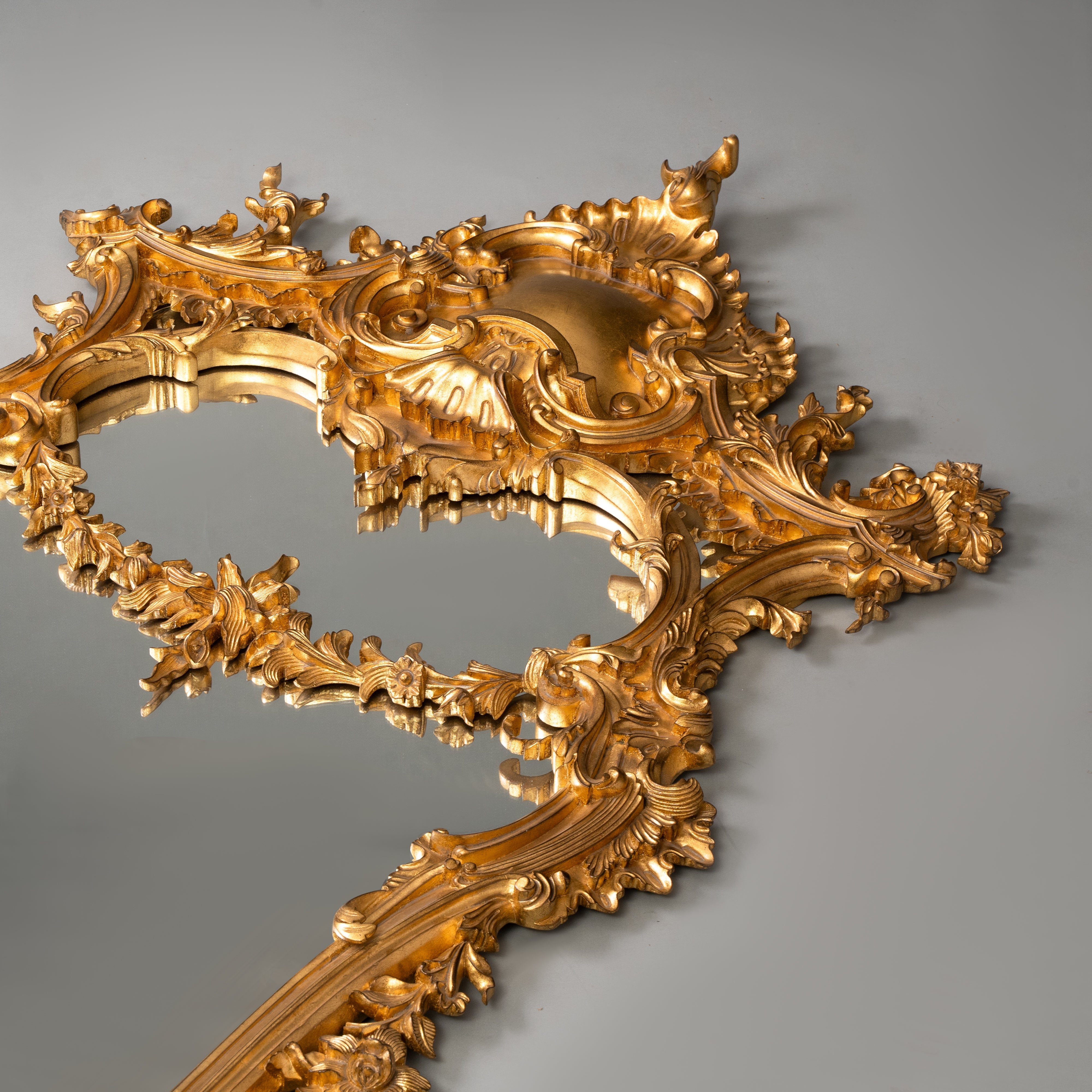 Rococo Style Giltwood Mirror with Elaborate Foliate Motifs