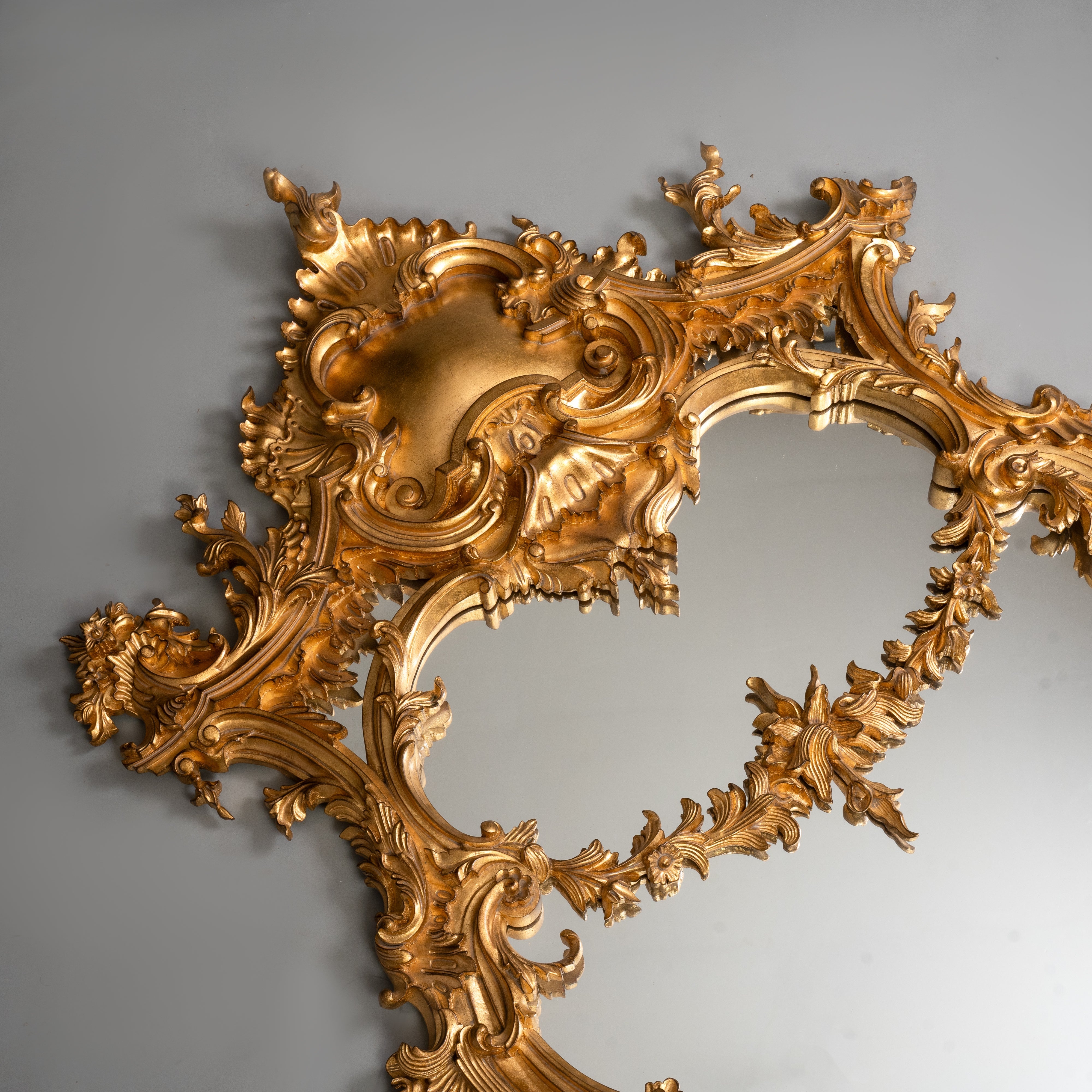 Rococo Style Giltwood Mirror with Elaborate Foliate Motifs