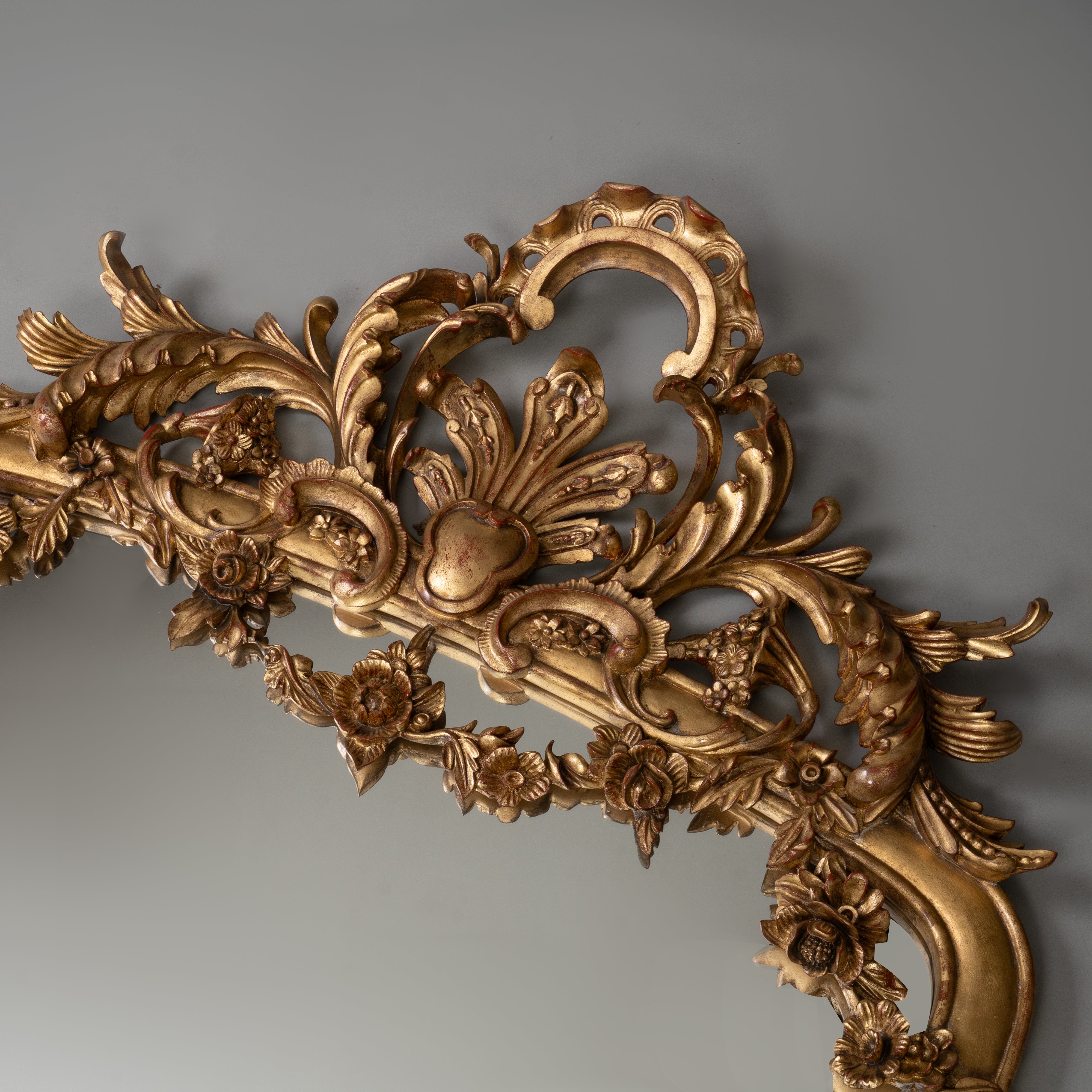 Antique Giltwood Mirror with Ornate Floral Detailing