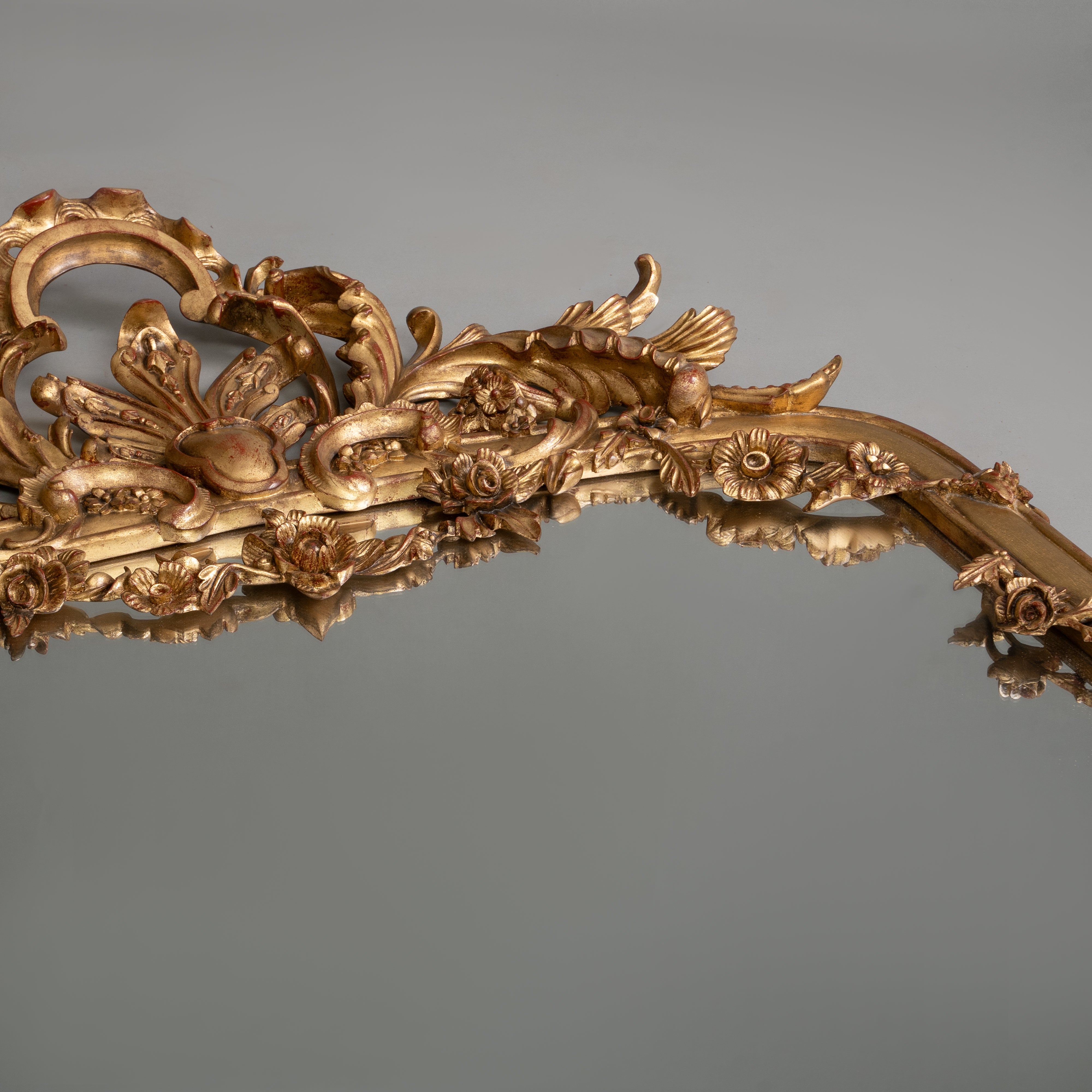 Antique Giltwood Mirror with Ornate Floral Detailing
