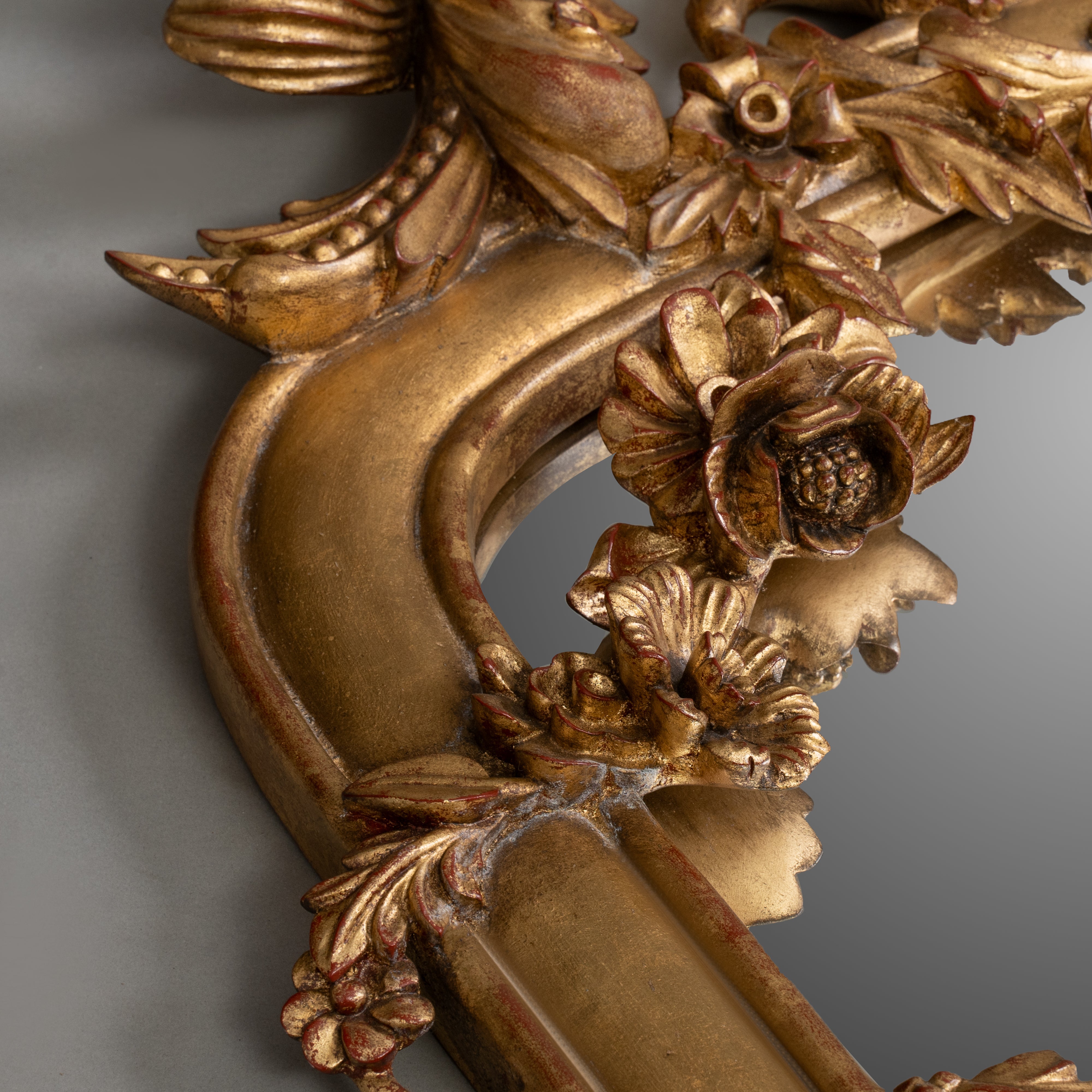 Antique Giltwood Mirror with Ornate Floral Detailing