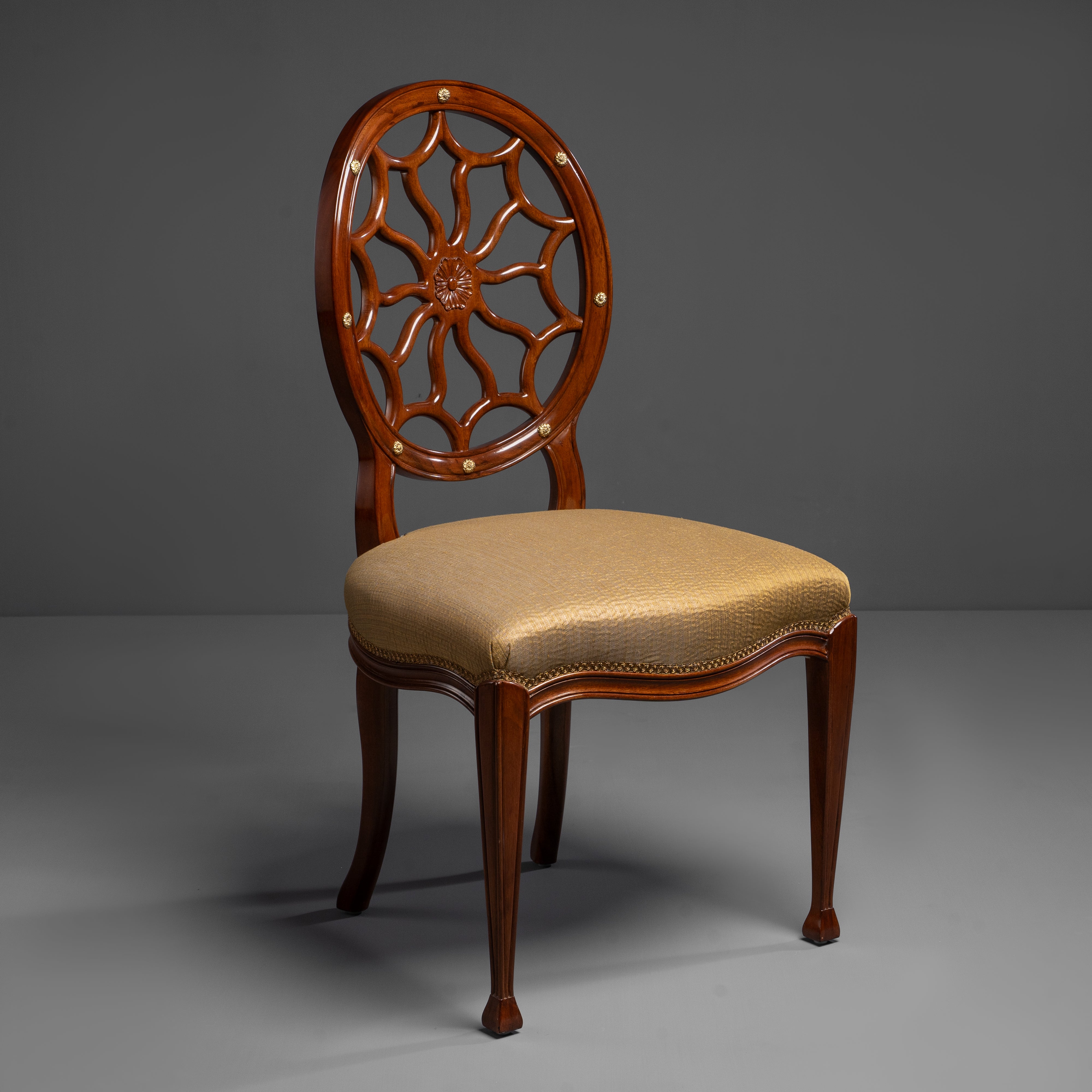 Refined Accent Chair with Decorative  Openwork Back and Brass details