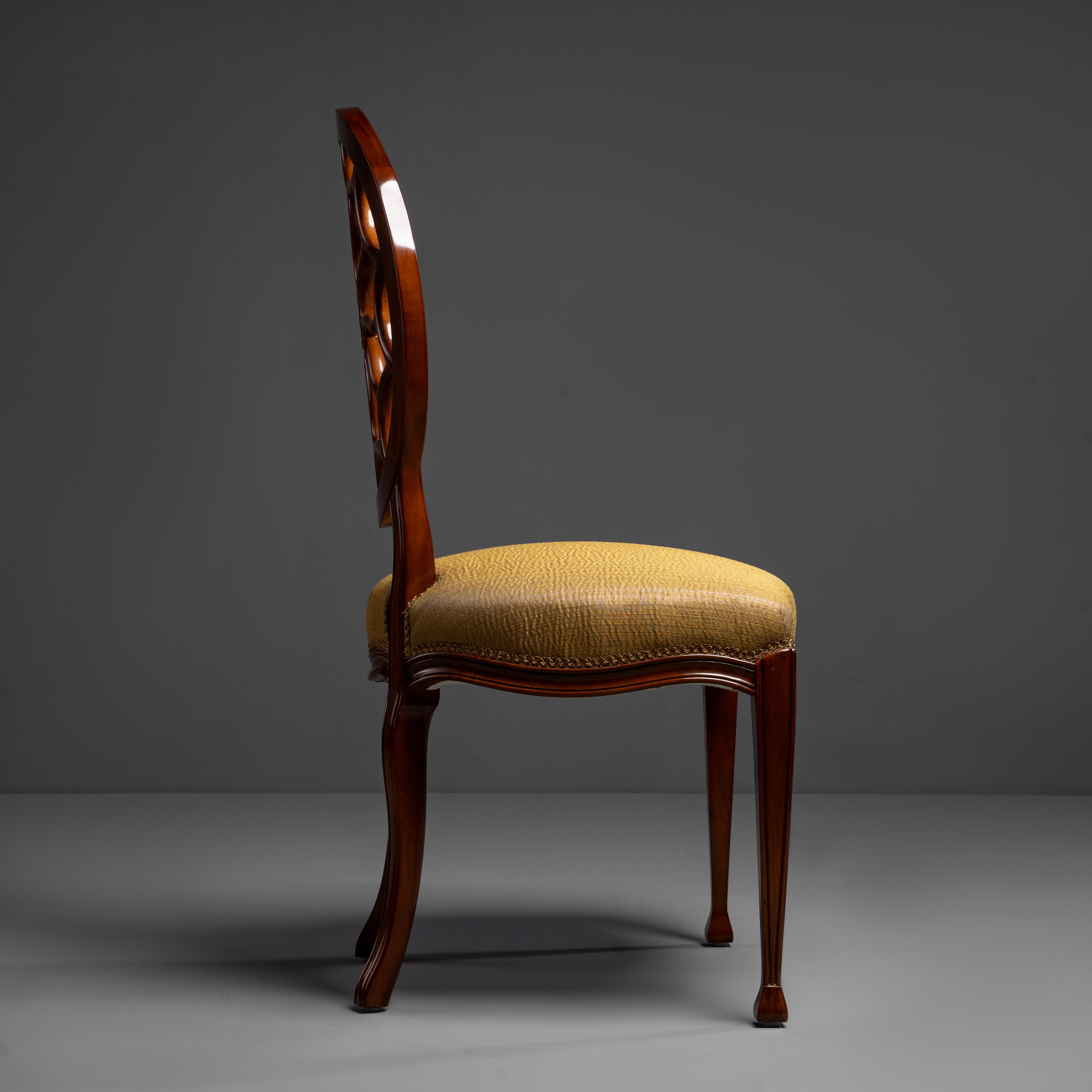 Refined Accent Chair with Decorative  Openwork Back and Brass details