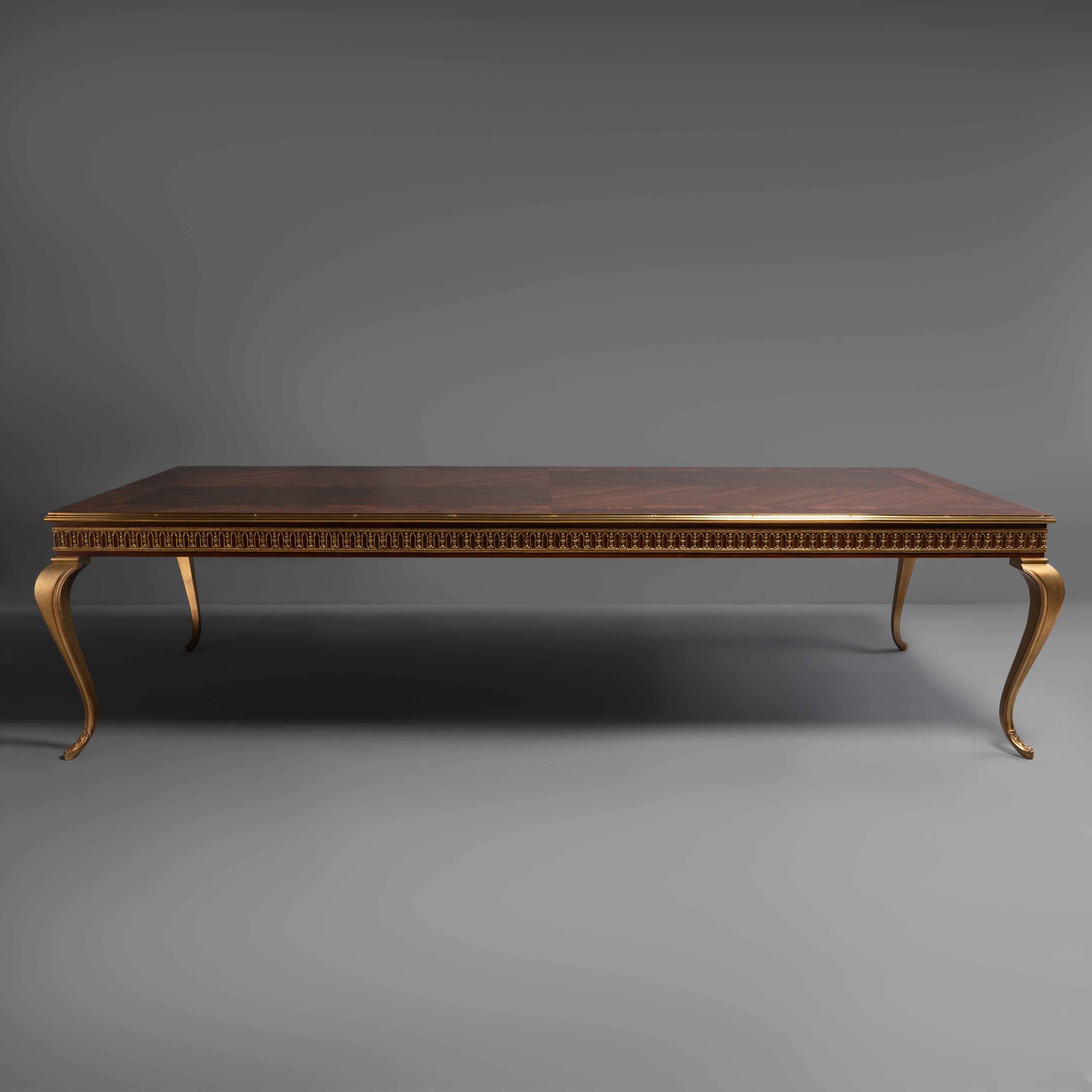 Elegant French-Style Giltwood Dining Table  with Veneer Top and Brass Motif
