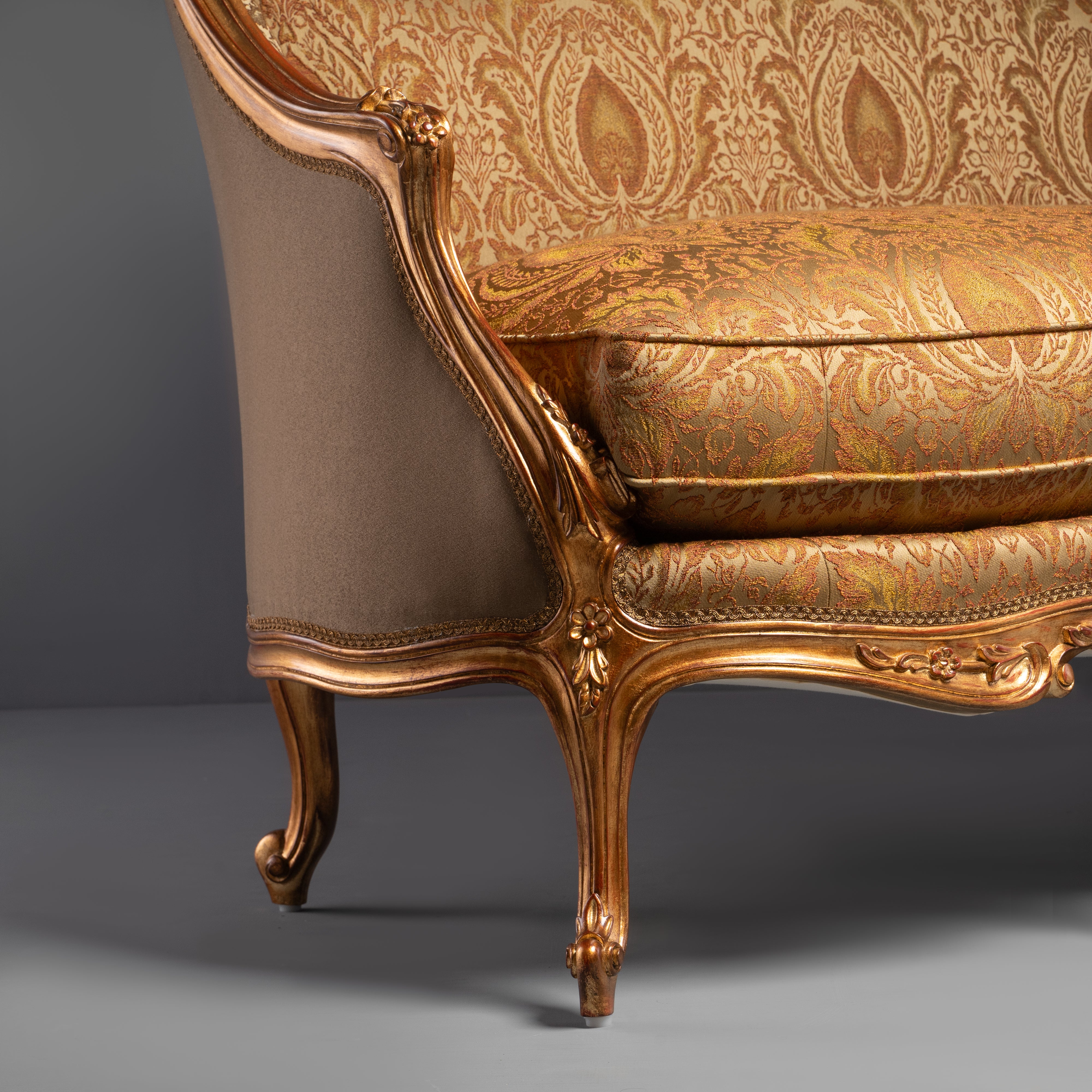 Hand-Carved Rococo Revival Gilt Sofa with Intricate Floral Motifs