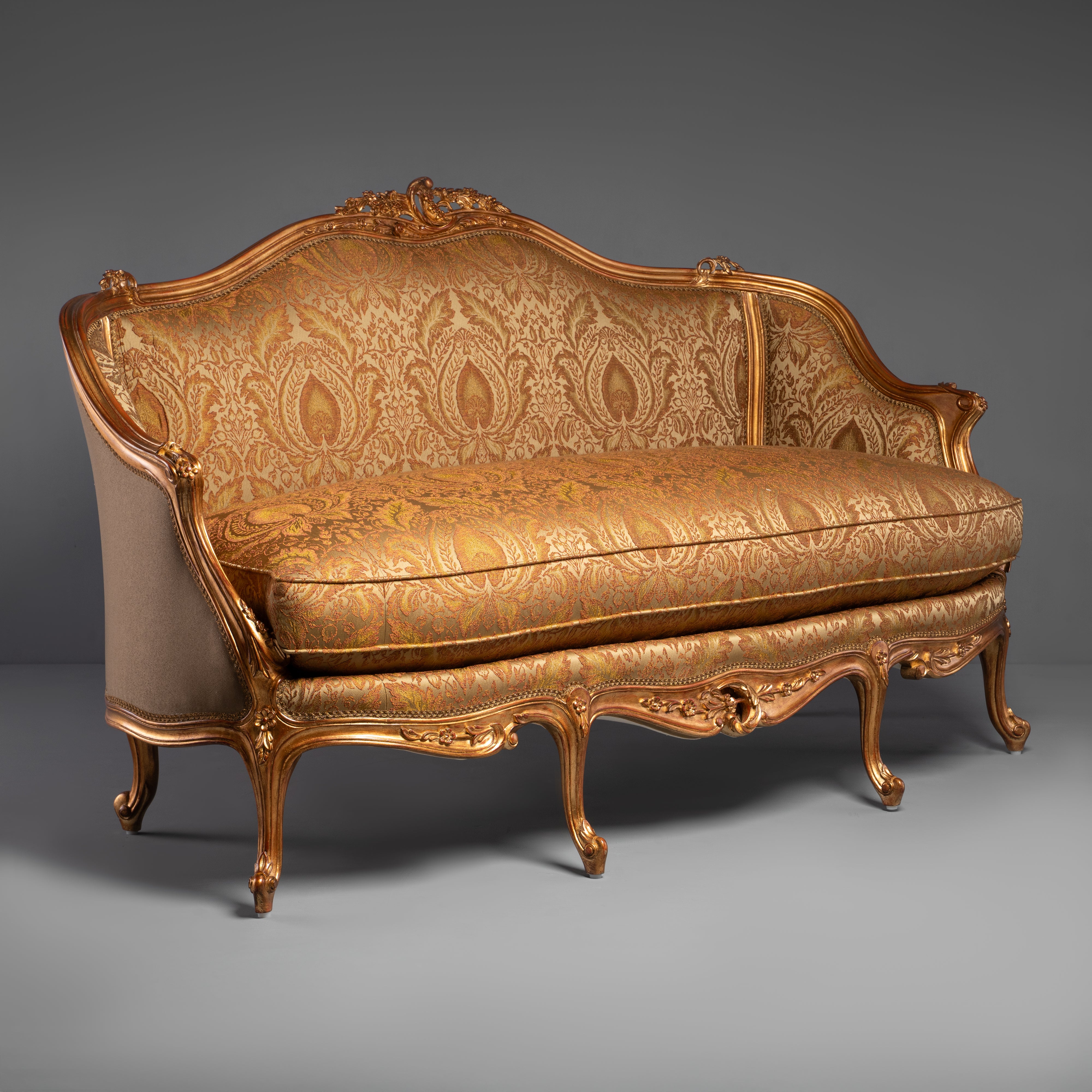 Hand-Carved Rococo Revival Gilt Sofa with Intricate Floral Motifs