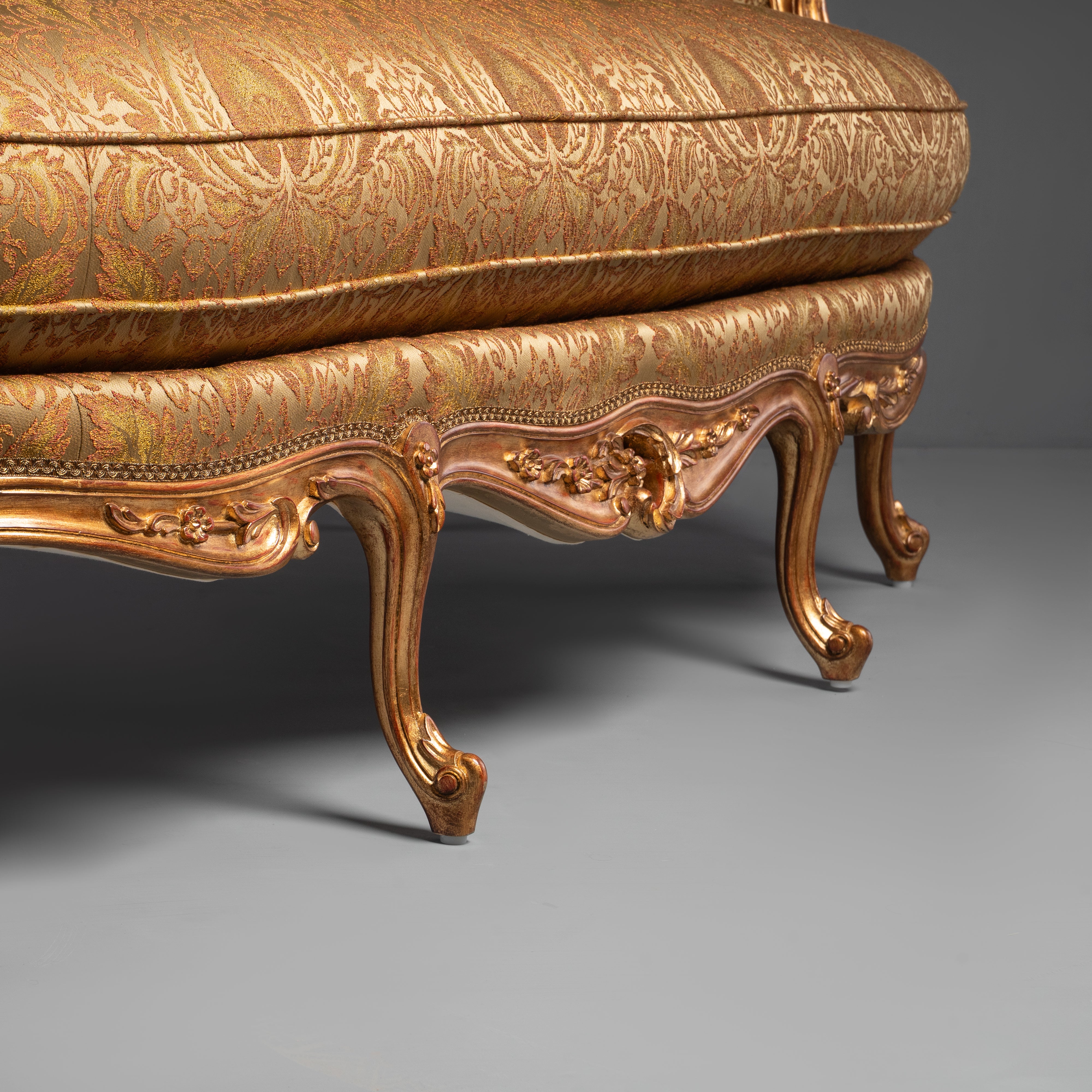 Hand-Carved Rococo Revival Gilt Sofa with Intricate Floral Motifs